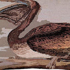Brown Pelican Audubon Bird pillow fabric closeup showing hand-embroidered needlepoint wool texture and color detail