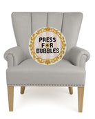 Bubbles Bell Hooked Wool Throw Pillow on an armchair, showing the throw pillow at room scale, 16x16 inch