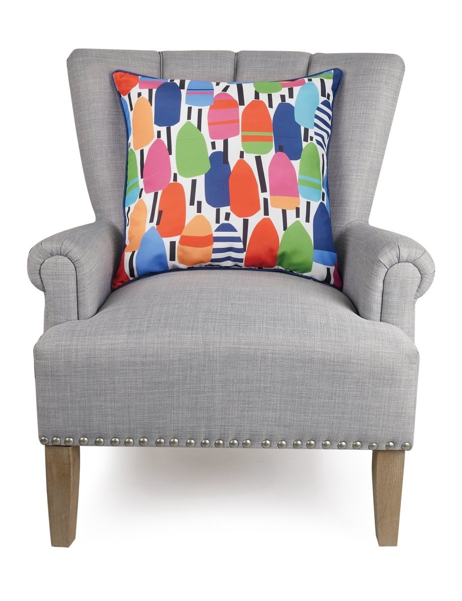 Buoy Printed Throw Pillow on an armchair, showing the throw pillow at room scale, 20x20 inch