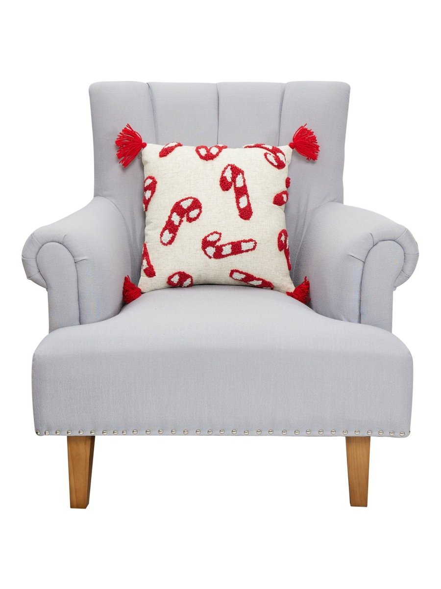 Candy Canes with Tassels Hooked Christmas Throw Pillow on an armchair, showing the throw pillow at room scale, 16x16 inch