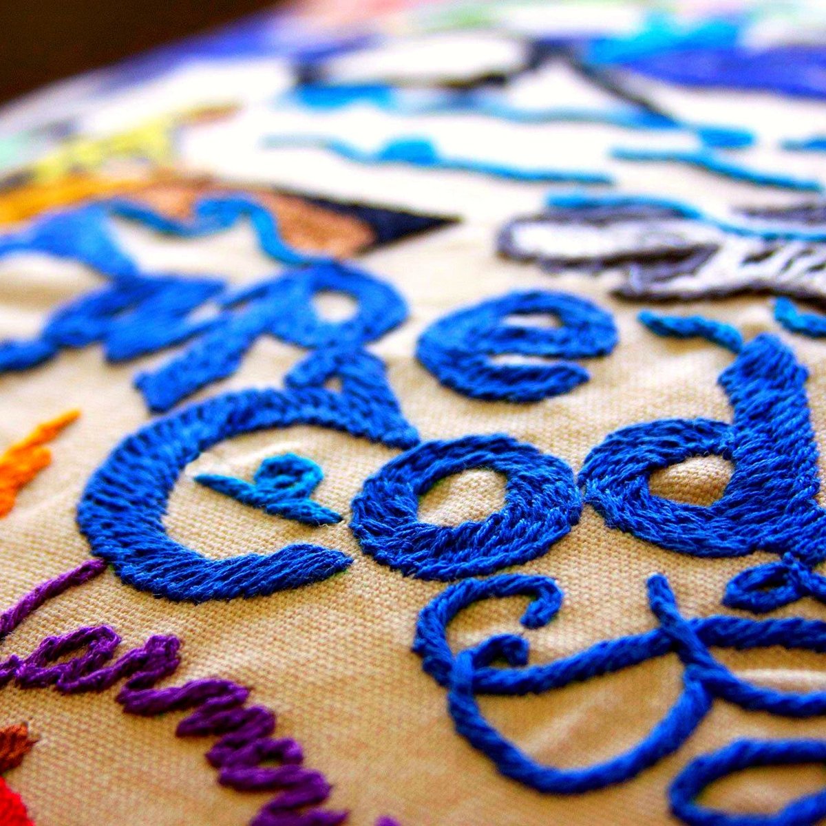 Cape Cod Beachfront Embroidered Throw Pillow - close-up detail of hand-embroidered needlepoint stitching