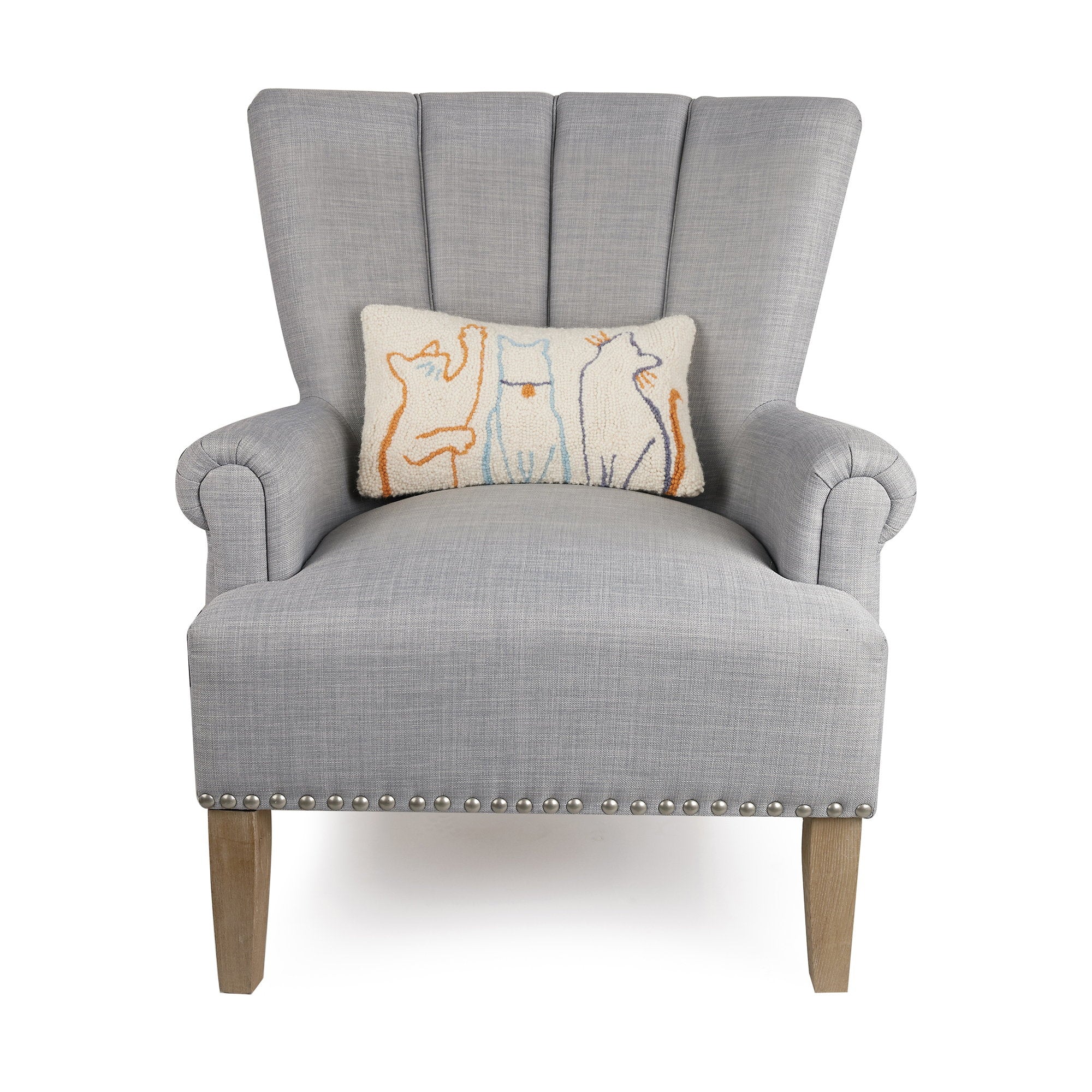 Cat Hooked Wool Throw Pillow on an armchair, showing the throw pillow at room scale, 9x16 inch