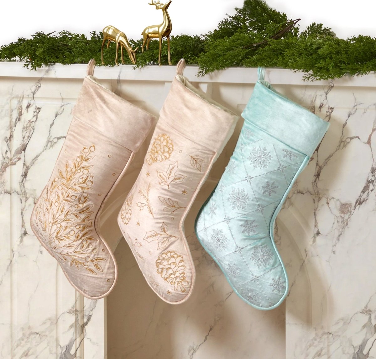 Champagne Tree Velvet Embroidered Christmas Stocking shown alongside other designs in the same collection, 12x20 inch