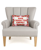 Character Energy Embroidered Needlepoint Throw Pillow on an armchair, showing the throw pillow at room scale, 10x14 inch