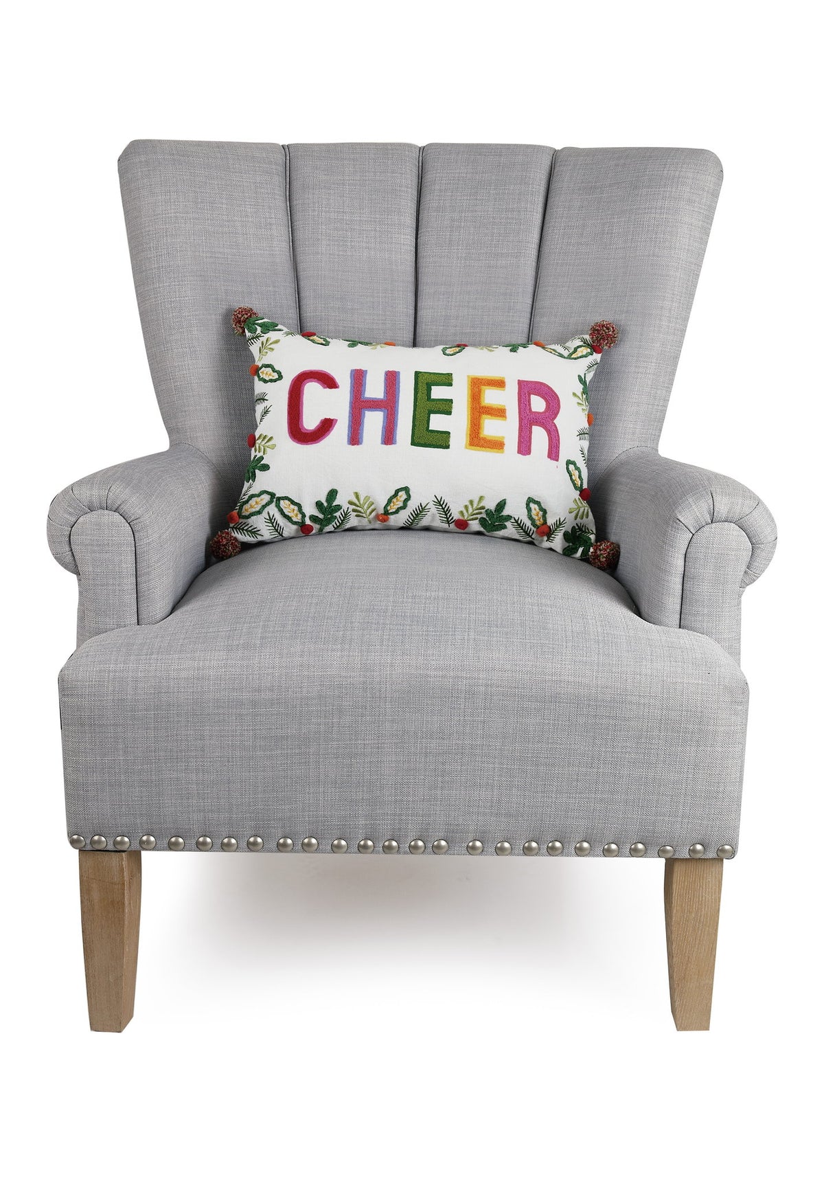 Cheer with Poms Embroidered Christmas Throw Pillow on an armchair, showing the throw pillow at room scale, 12x18 inch