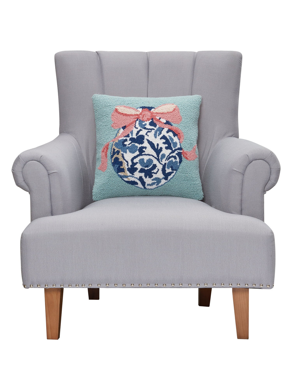 Chinoiserie Easter Egg Hooked Wool Throw Pillow on an armchair, showing the throw pillow at room scale, 16x16 inch