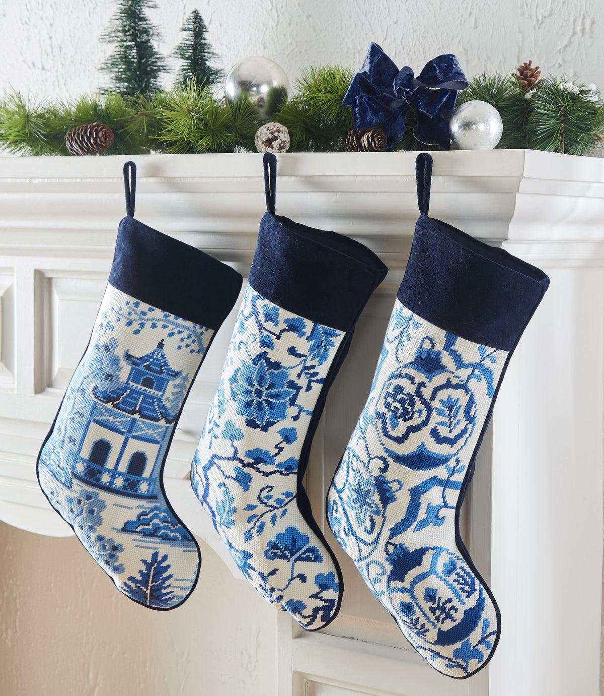 Chinoiserie Embroidered Needlepoint Christmas Stocking shown alongside other designs in the same collection, 11x18 inch