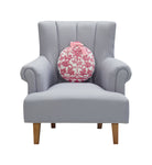 Chinoiserie Shape Hooked Wool Christmas Throw Pillow on an armchair, showing the throw pillow at room scale, 14x14 inch