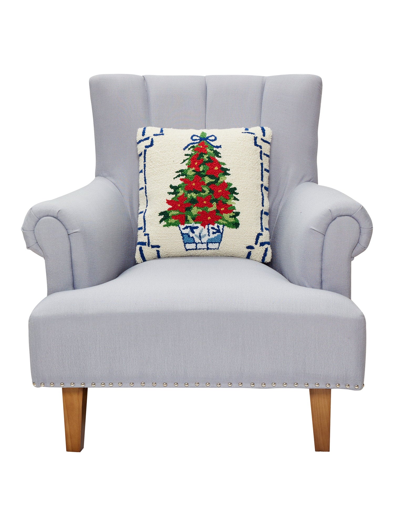 Chinoiserie Tree Hooked Wool Christmas Throw Pillow on an armchair, showing the throw pillow at room scale, 16x16 inch