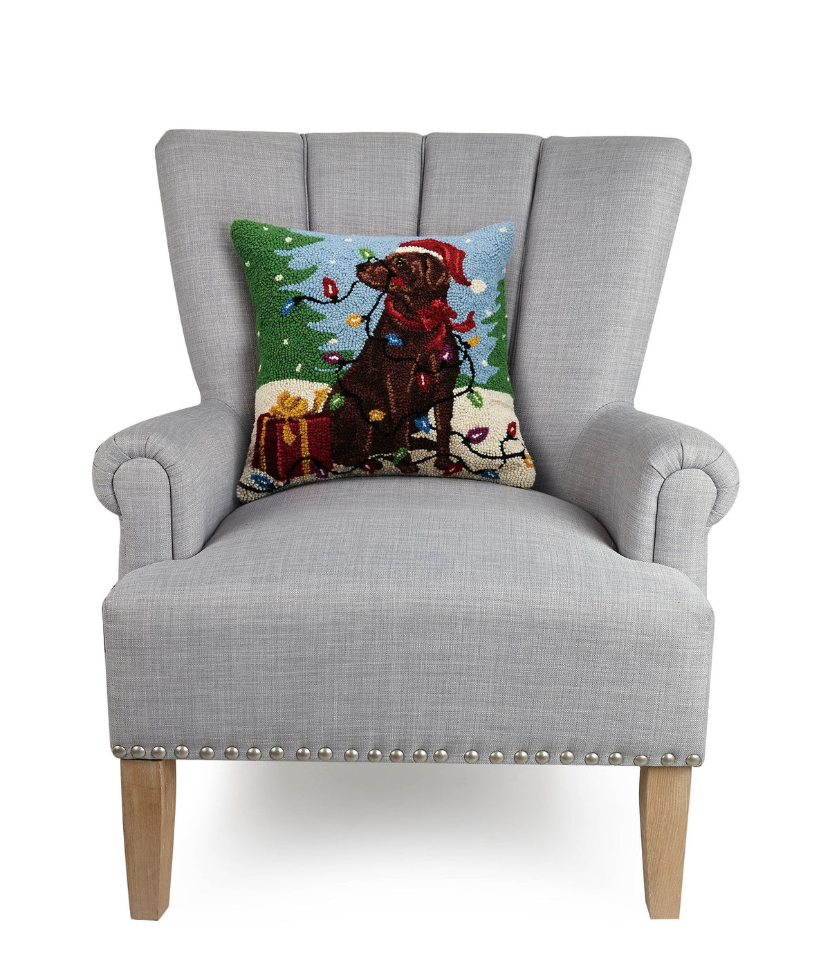 Chocolate Labrador with Lights Hooked Wool Christmas Throw Pillow on an armchair, showing the throw pillow at room scale, 16x16 inch