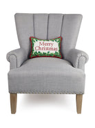 Christmas Embroidered Needlepoint Throw Pillow on an armchair, showing the throw pillow at room scale, 9x16 inch