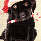 Hand-stitched wool detail of Christmas Holiday Black Lab Puppy needlepoint pillow showing intricate weave pattern and texture