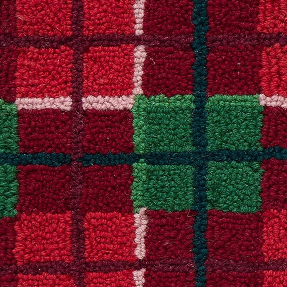 Closeup of Christmas Plaid Hooked Wool Stocking showing stitch texture and craftsmanship detail