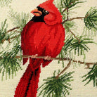 Hand-stitched wool detail of Christmas Red Cardinal Bird needlepoint pillow showing intricate weave pattern and texture