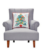 Christmas Tree Printed Throw Pillow on an armchair, showing the throw pillow at room scale, 18x18 inch