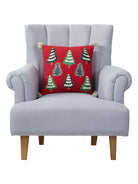 Christmas Trees with Pom Poms Embroidered Throw Pillow on an armchair, showing the throw pillow at room scale, 16x16 inch