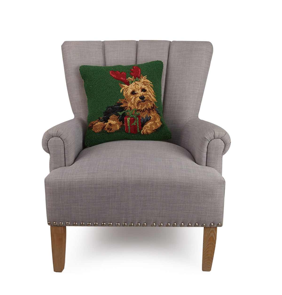 Christmas Yorkshire Terrier Hooked Wool Throw Pillow on an armchair, showing the throw pillow at room scale, 16x16 inch