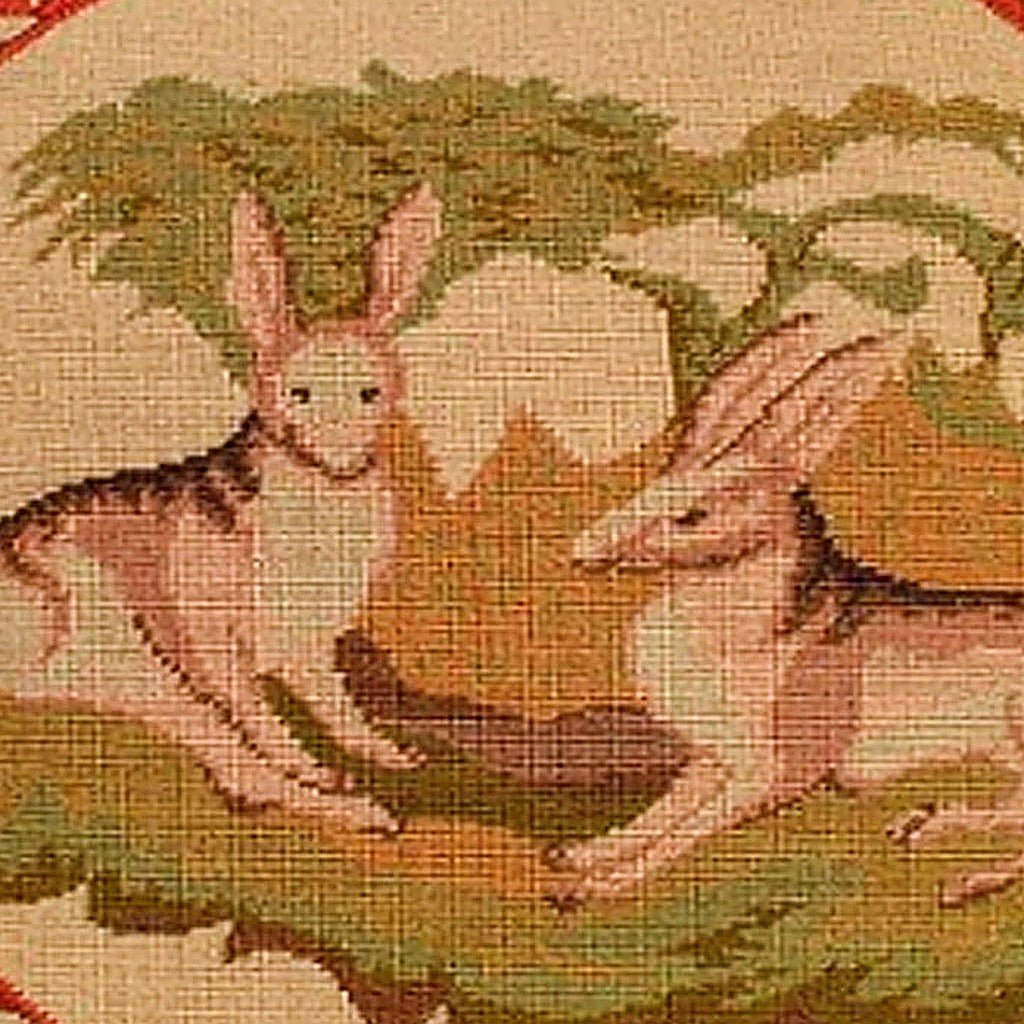 Closeup of Classic Lancaster Hares needlepoint throw pillow highlighting hand-stitched wool craftsmanship and fabric detail