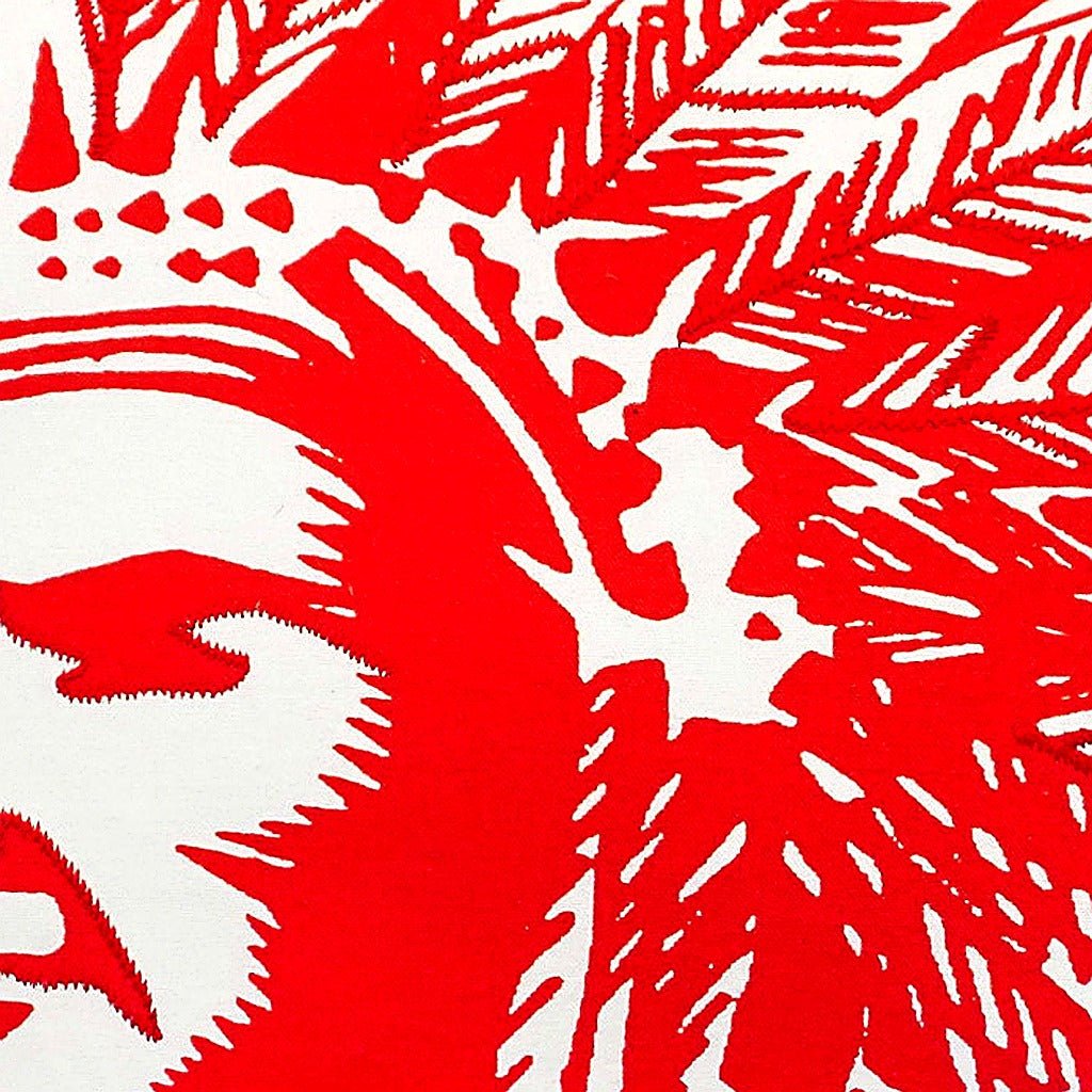 Hand-stitched wool detail of Classic Red Warrior Block needlepoint pillow showing intricate weave pattern and texture