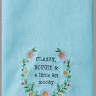 Closeup of Classy Bougie Embroidered Kitchen Towel showing stitch texture and craftsmanship detail