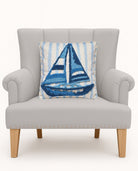 Coastal Sailboat Tufted Hooked Throw Pillow on an armchair, showing the throw pillow at room scale, 16x16 inch