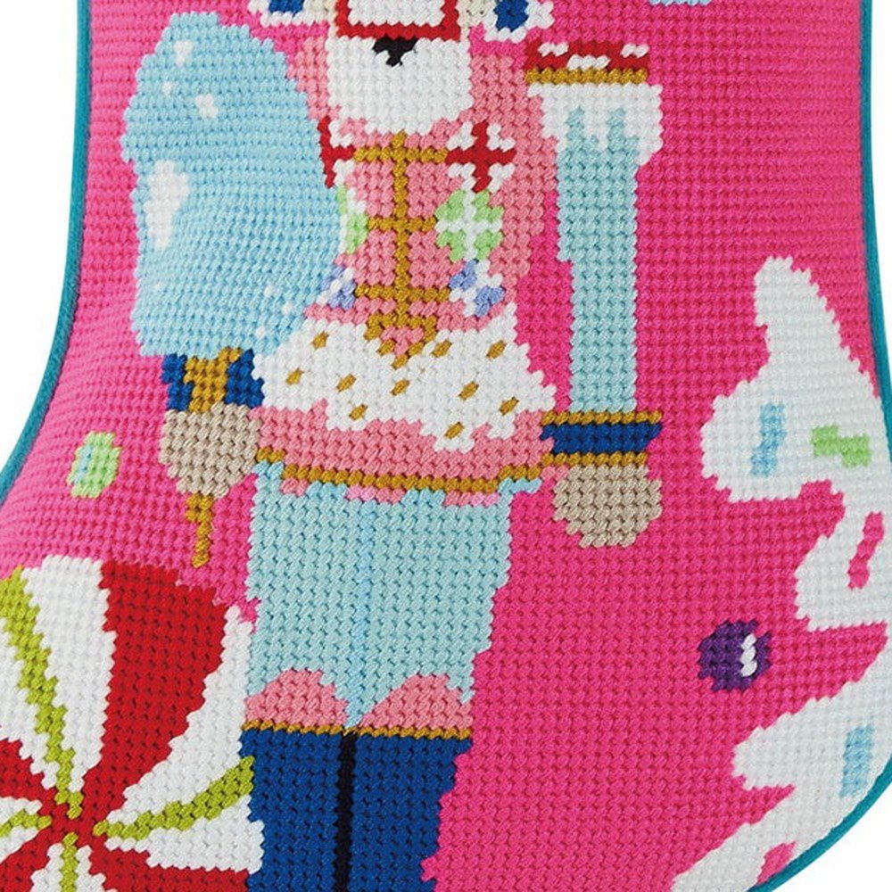 Closeup of Colonel Cupcake Embroidered Needlepoint Christmas Stocking showing stitch texture and craftsmanship detail