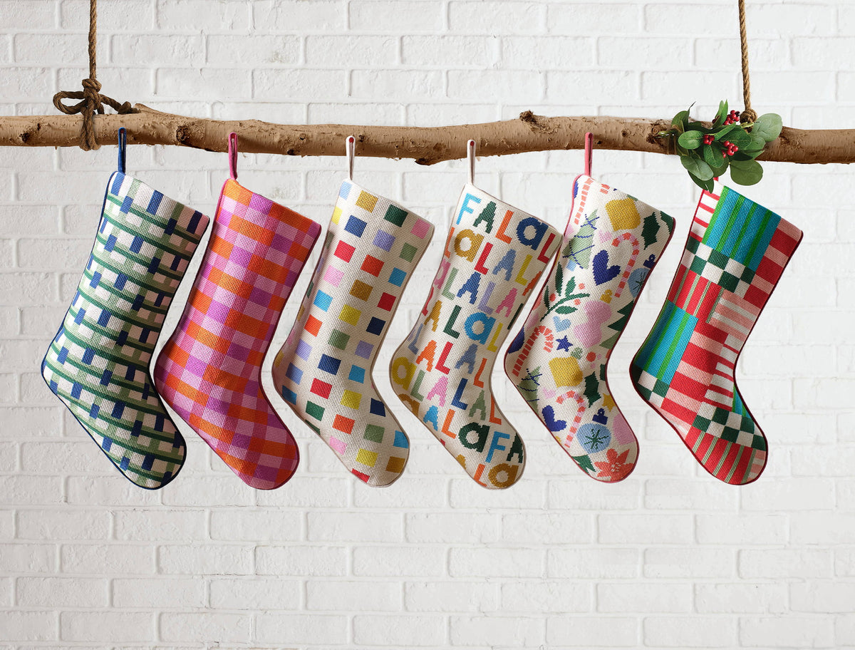 Color Block Embroidered Needlepoint Christmas Stocking shown alongside other designs in the same collection, 11x18 inch