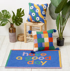 Colorful Check with Tassels Hooked Wool Throw Pillow shown alongside other designs in the same collection, 16x16 inch