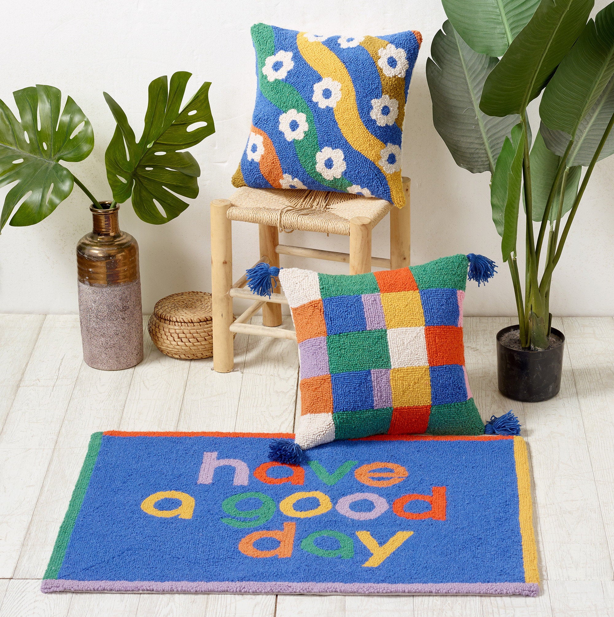 Colorful Check with Tassels Hooked Wool Throw Pillow shown alongside other designs in the same collection, 16x16 inch