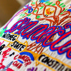 Connecticut State Charm Travel Embroidered Throw Pillow - close-up detail of hand-embroidered needlepoint stitching