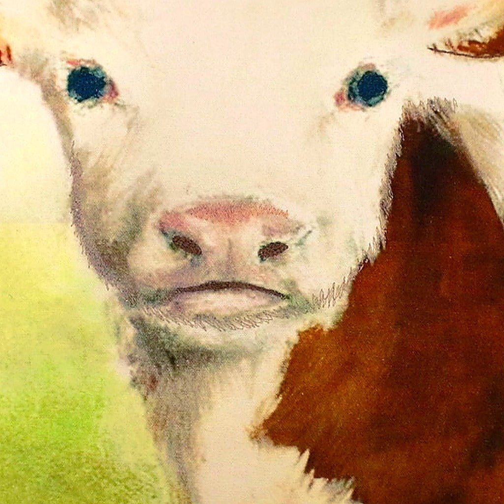 Hand-stitched wool detail of Cow needlepoint pillow showing intricate weave pattern and texture