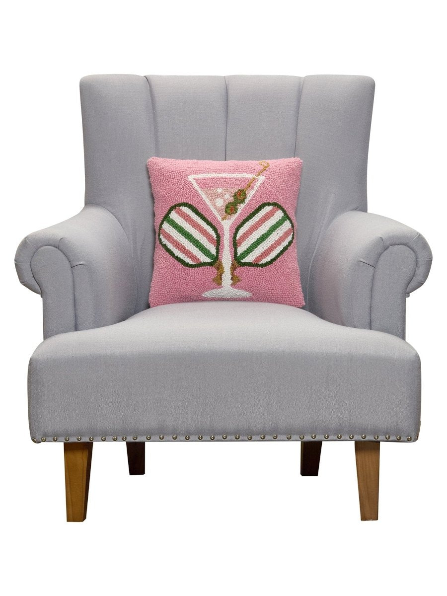 Crossed Paddles Martini Hooked Wool Throw Pillow on an armchair, showing the throw pillow at room scale, 14x14 inch