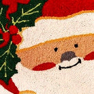 Closeup of Cute Happy Santa Wool Needlepoint Holiday needlepoint throw pillow highlighting hand-stitched wool craftsmanship and fabric detail