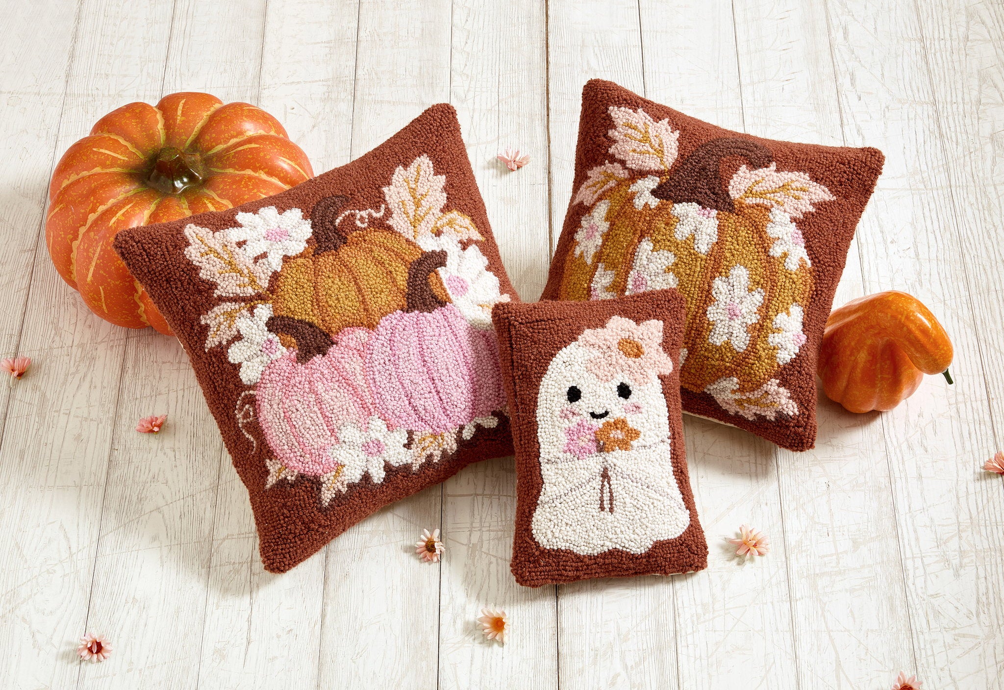Daisies and Pumpkin Trio Hooked Wool Fall Harvest Throw Pillow shown alongside other designs in the same collection, 16x16 inch