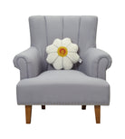Daisy Shaped Hooked Wool Throw Pillow on an armchair, showing the throw pillow at room scale, 14x14 inch