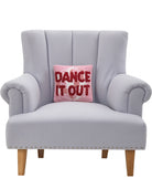 Dance It Out Hooked Wool Throw Pillow on an armchair, showing the throw pillow at room scale, 10x10 inch