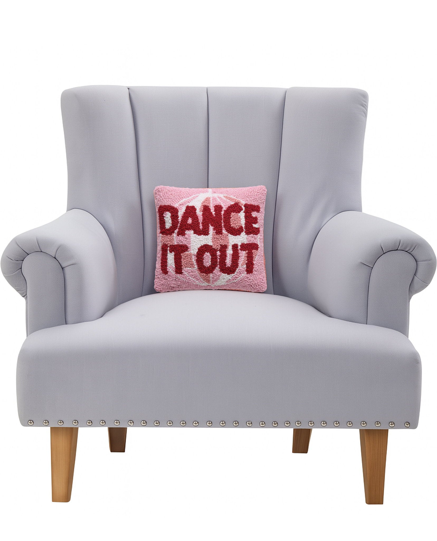 Dance It Out Hooked Wool Throw Pillow on an armchair, showing the throw pillow at room scale, 10x10 inch