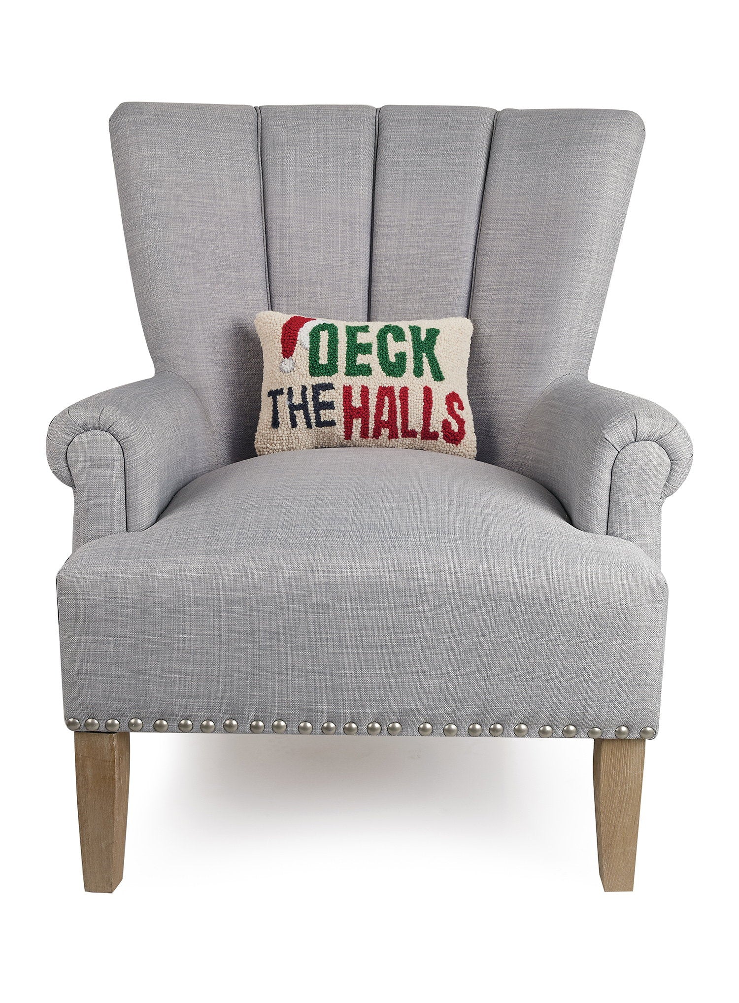 Deck the Halls Hooked Wool Christmas Throw Pillow on an armchair, showing the throw pillow at room scale, 8x12 inch
