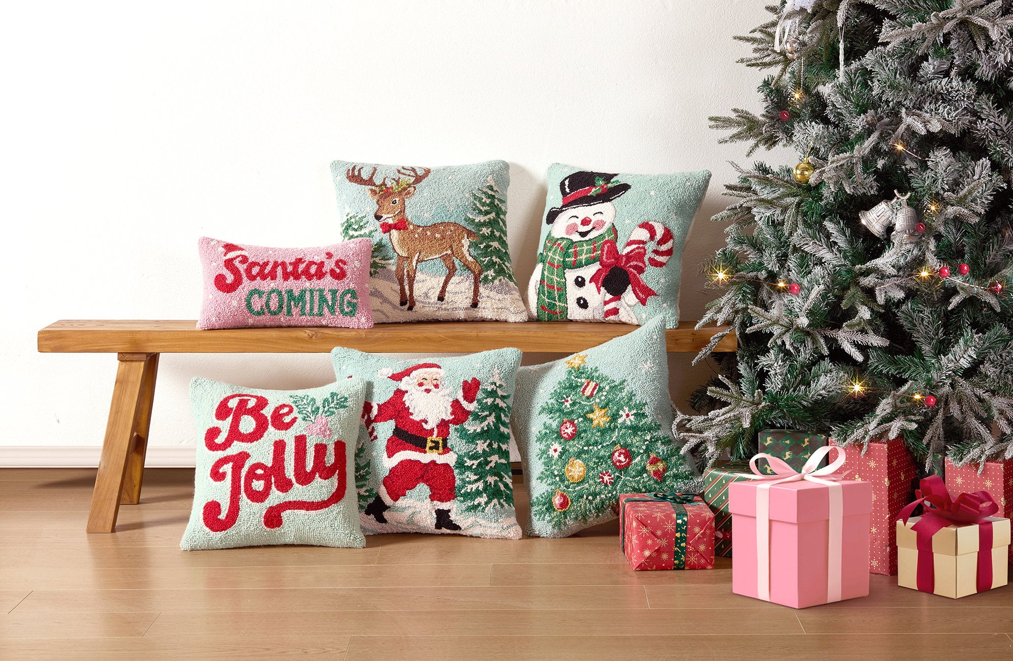 Decorating Tree Hooked Wool Christmas Throw Pillow shown alongside other designs in the same collection, 18x18 inch