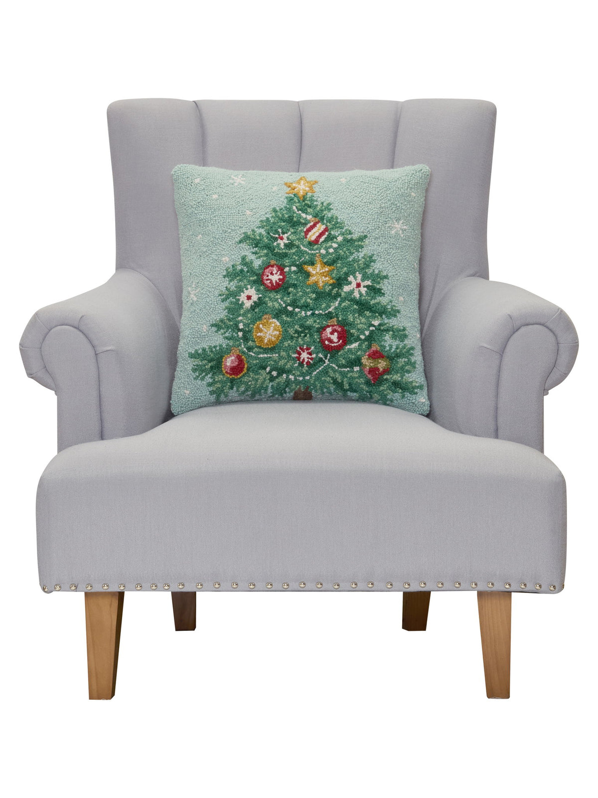 Decorating Tree Hooked Wool Christmas Throw Pillow on an armchair, showing the throw pillow at room scale, 18x18 inch