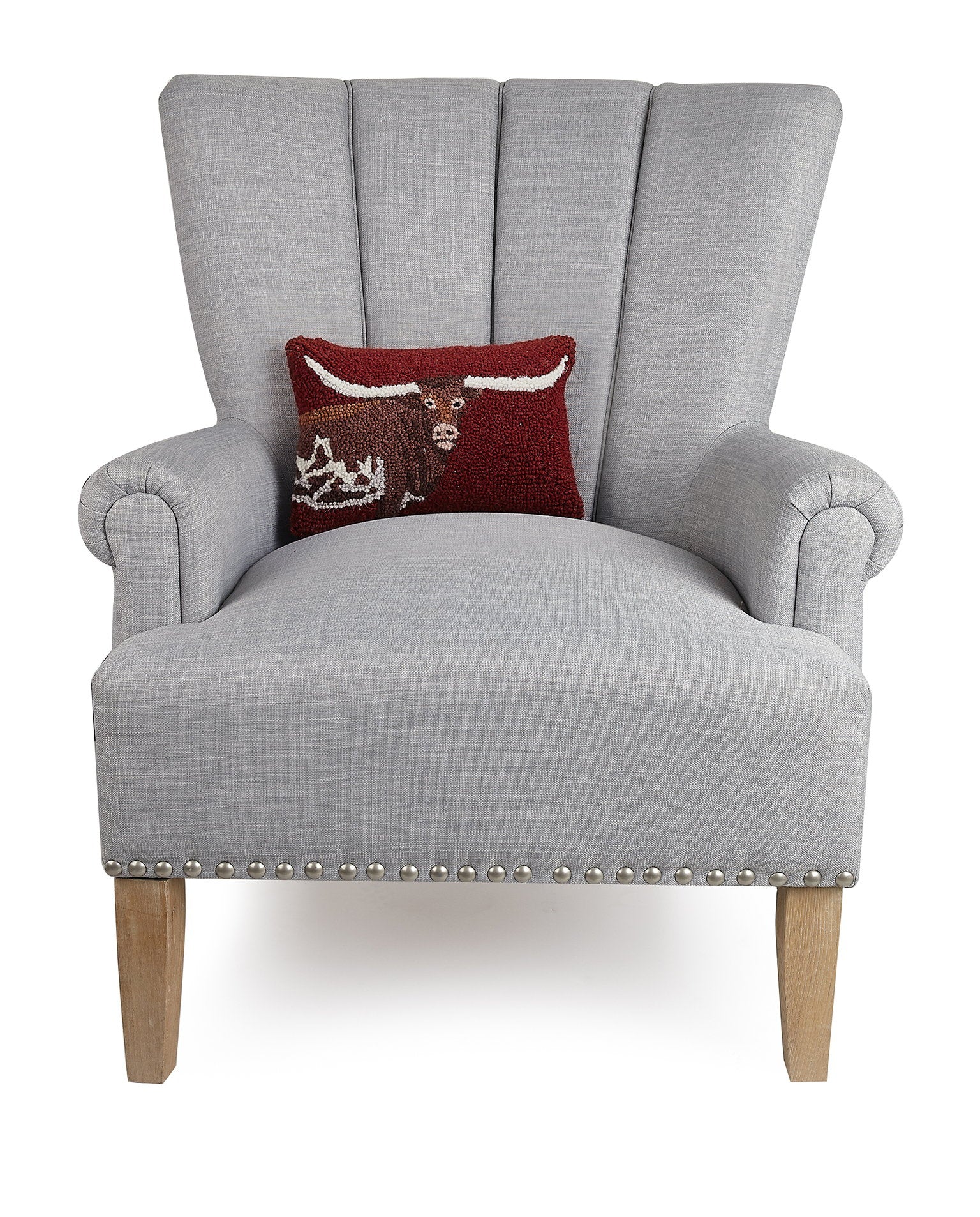 Deep Red Longhorn Hooked Wool Throw Pillow on an armchair, showing the throw pillow at room scale, 8x12 inch