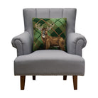 Deer Plaid Hooked Wool Throw Pillow on an armchair, showing the throw pillow at room scale, 18x18 inch