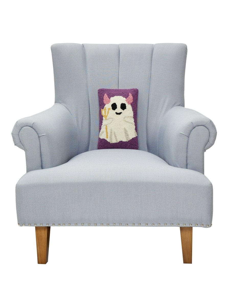 Devil Ghost Hooked Wool Halloween Throw Pillow on an armchair, showing the throw pillow at room scale, 8x12 inch