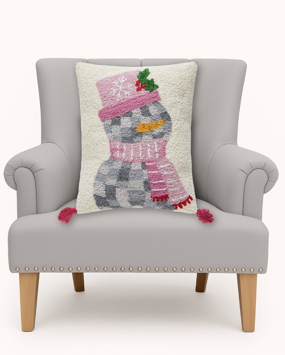 Disco Snowman with Tassels Hooked Wool Christmas Throw Pillow on an armchair, showing the throw pillow at room scale, 14x18 inch