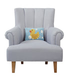 Duckling Hooked Wool Throw Pillow on an armchair, showing the throw pillow at room scale, 8x12 inch