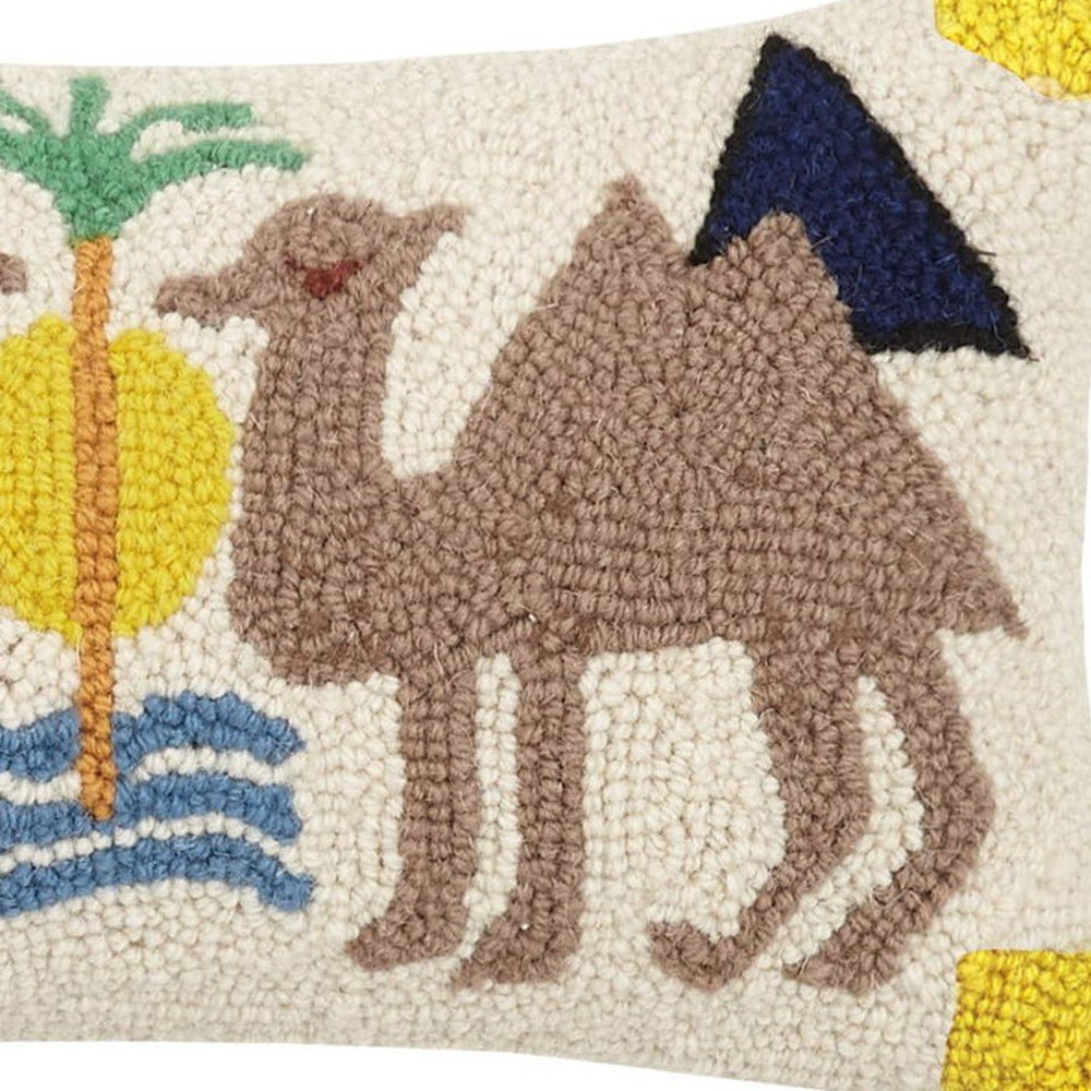 Closeup of Dune with Tassels Hooked Wool Throw Pillow showing stitch texture and craftsmanship detail