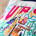 European Charm Embroidered Throw Pillow - close-up detail of hand-embroidered needlepoint stitching