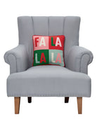 Fa La La Quadrant Embroidered Needlepoint Throw Pillow on an armchair, showing the throw pillow at room scale, 14x14 inch