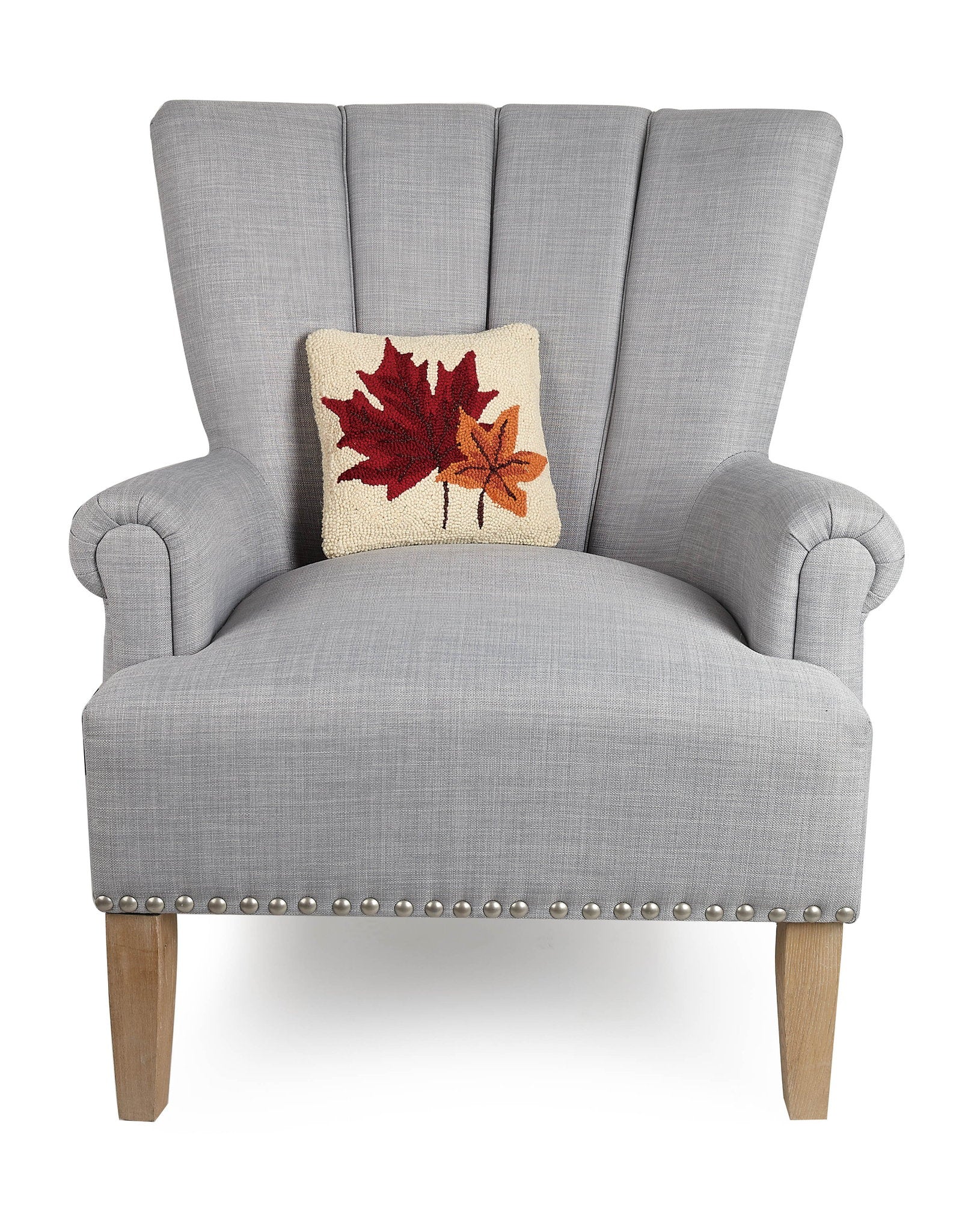 Fall Leaves Hooked Wool Throw Pillow on an armchair, showing the throw pillow at room scale, 10x10 inch
