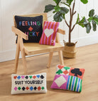 Feeling Lucky Hooked Wool Throw Pillow shown alongside other designs in the same collection, 14x14 inch